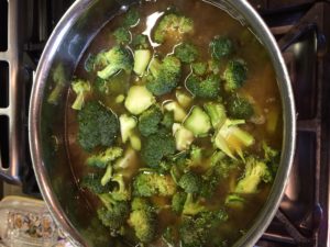 Broccoli, onions, broth